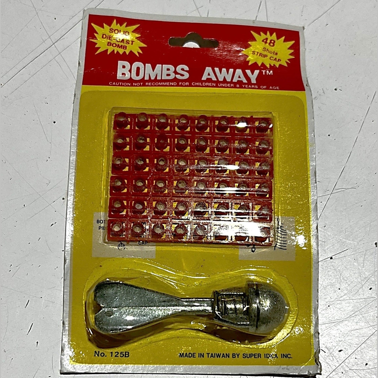 Vintage Bombs Away Cap Toy