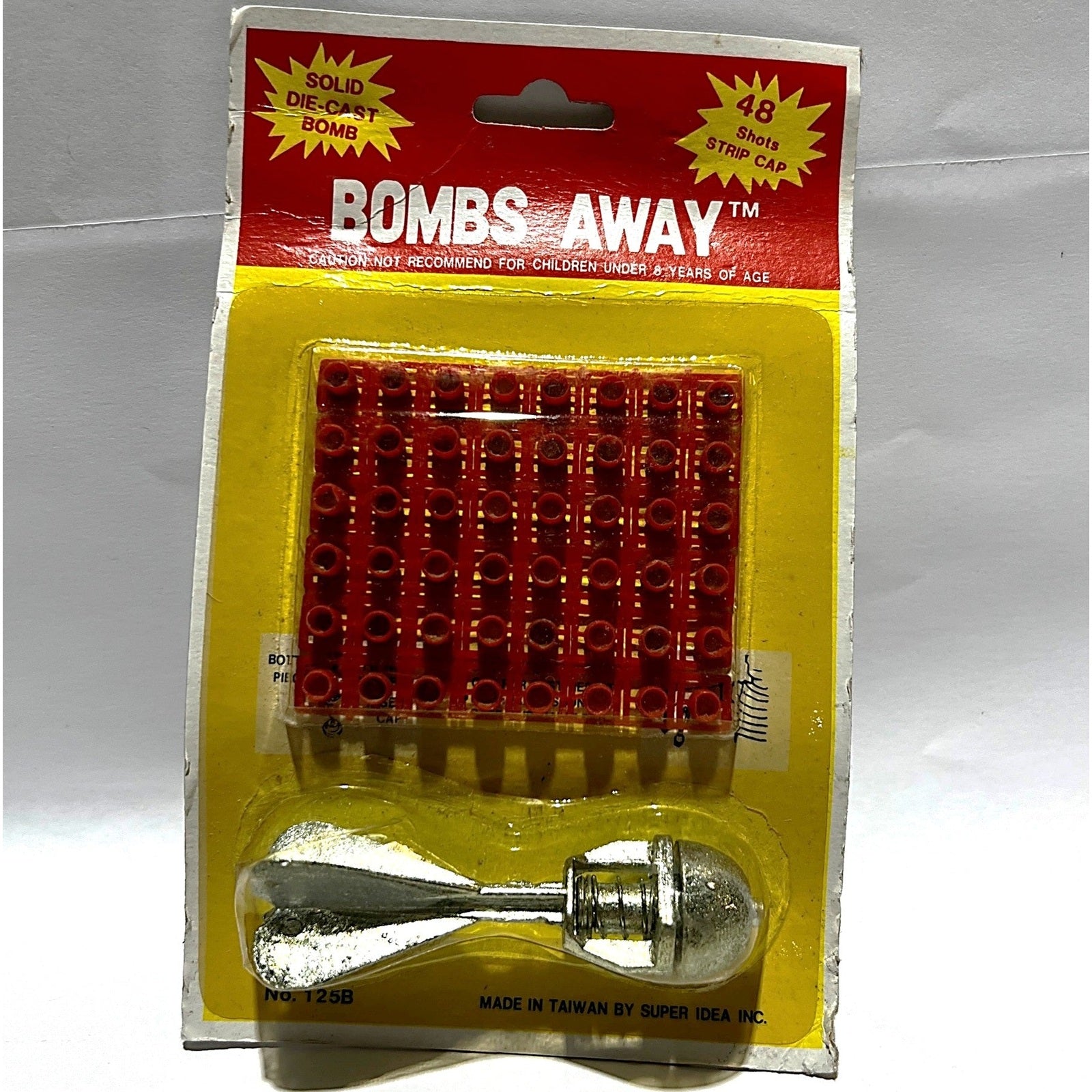 Vintage Bombs Away Cap Toy